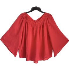 Elevate Your Casual Wardrobe With This Beautiful Jpr Studio Dolman-Sleeve Top In Poinsettia. The Kimono Sleeves And V-Neckline Add A Touch Of Bohemian Style While The Crochet Accents Provide A Unique Detail. Made From 100% Cotton, This Lightweight And Breathable Blouse Is Perfect For Any Season, Whether It's Summer, Spring, Winter, Or Fall. The Machine Washable Garment Care Ensures Easy Maintenance, Making It A Convenient Addition To Your Closet. Pit To Pit: 23” Length: 24” Red V-neck Blouse Relaxed Fit, Cotton Bell Sleeve Tops For Fall, Relaxed Fit V-neck Peasant Top For Fall, V-neck Relaxed Fit Peasant Top For Fall, Fall V-neck Relaxed Fit Peasant Top, Casual Red V-neck Peasant Top, Casual V-neck Holiday Tops, Casual Bell Sleeve Peasant Top For Fall, Red Peasant Top For Fall