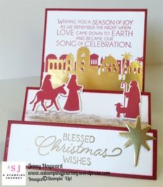 two christmas cards with gold and red designs on them, one has a nativity scene