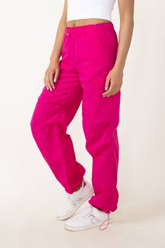 Stand out from the crowd in these fashionable Love Tree Nylon Cargo Baggy Parachute Pants for Women in Pink! The lightweight and durable nylon material provides comfort and functionality, while the vibrant magenta color adds a touch of fun to your wardrobe. Be confident and stylish in these statement pants! Features: Love Tree Style: 6866PN-MAGENTA Color: Pink 100% Nylon Women’s pants One cargo side pocket Hand side pockets Elastic waistband Moisture wicking Soft lite material Drawstring waistba Baggy Parachute Pants, Statement Pants, Magenta Color, Love Tree, Small Waist, Drawstring Waistband, Parachute Pants, Casual Pants, Pants For Women