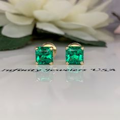 "These earrings are radiant cut lab created emeralds made set in 14k yellow gold item #6326 *also shown in 14k white gold Earring back style is subject to change due to availability. -Approximate total carat weight: 2.00ctw. -Center Stone Size: 1.00ct each 6x6mm -Metal Type and Purity: 14K yellow Gold -Setting: 4 Prong Basket Style -Backing: Screw back (earring backs are subject to change due to availability) -Gem Type: Lab Created Emerald -Stone Shape: Asscher Cut -Stone Clarity: VS2 -Stone Col Formal Rectangular Earrings With May Birthstone, Fine Jewelry Emerald Rectangular Earrings, Rectangular Emerald Earrings Fine Jewelry, Emerald Rectangular Earrings For May Birthstone, Fine Jewelry Radiant Cut Earrings Gift, Gold Emerald Earrings With Brilliant Cut, Classic Emerald Cut Emerald Earrings, Green Baguette Cut Earrings For Gifts, Baguette Cut Emerald Earrings As A Gift