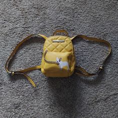 Brand New Without Tags Betsey Johnson Mini Frenchie Backpack/Handbag Mustard Yellow Floral Print Inside Silver Hardware 2 Inside Pockets Trendy Yellow Backpack Bag, Trendy Yellow Backpack-style Shoulder Bag, Trendy Yellow Backpack Shoulder Bag, Trendy Yellow Backpack Style Shoulder Bag, Yellow Backpack With Adjustable Strap, Yellow Backpack With Adjustable Strap For On-the-go, Everyday Yellow Backpack With Removable Pouch, Yellow Shoulder Backpack With Adjustable Strap, Yellow Zipper Closure Backpack Shoulder Bag