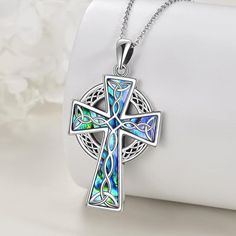 Elegant Celtic Cross Necklace: Elevate your style with the timeless elegance of our Celtic Knot Cross Necklace. The Celtic knot, also known as the trinity knot, is a symbol of good luck and best wishes for its owner. This dainty and exquisite necklace is a perfect gift that holds deep meaning and captures everyone's attention with its captivating design. Perfect Necklace Size: The pendant of this necklace boasts dimensions of 0.55 x 1.02 inches (14mm x 26mm), striking a balance between daintiness and visual impact. The chain measures 18 inches with an additional 2 inches extension, allowing you to customize the length to suit your preferences. The necklace weighs 4.1 grams, ensuring both comfort and style. Sterling Silver Brilliance: Crafted from premium quality, hypoallergenic platinum-pl Silver Cross Necklace Gift, Silver Cross Necklace For Gift, Mother's Day Sterling Silver Cross Necklace, Sterling Silver Cross Necklaces For Mother's Day, Silver Cross Pendant Necklace For Mother's Day, Silver Cross Necklace For Mother's Day, Silver Cross Jewelry For Mother's Day, Mother's Day Cross Pendant Jewelry, Silver Cross Pendant Jewelry For Mother's Day