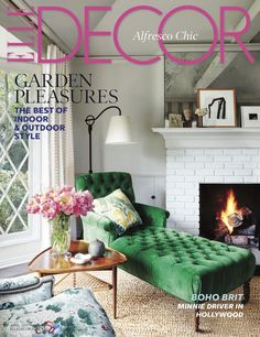 an image of a magazine cover with a green chair and fire place in the corner