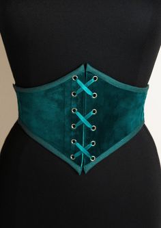 Do you like corsets but also like feeling comfortable in your clothes? This belt is made for you! This is an elastic waist cincher, made of quality duck blue velvet. Steel bones on the front of the belt provide support and give the illusion that it is a real corset. The sturdy elastic that makes up the back of this accessory provides greater sheathing than a classic belt and will adapt perfectly to your size. Possibility of choosing this model with braid (on request) or only with a cotton border Fitted Corset Belt For Costume, Teal Corset, Duck Blue, Classic Belt, Corset Belt, Waist Cincher, Suspender Belt, Fantasy Fashion, Green Velvet