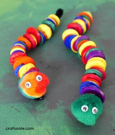 the very colorful caterpillar has eyes on it's head and is ready to be played with