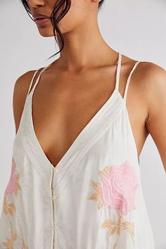 Your new go-to tank featured in a flowy, V-neck silhouette with button-front detailing and femme, floral embroidery throughout for an added special touch Scalloped bottom hem Strappy back detail Relaxed, longline fit Embroidered Tunic, Cropped Denim Jacket, Trend Forecasting, Tank Top Cami, Cropped Denim, Cami Tanks, Boho Tops, Boho Outfits, Floral Embroidery