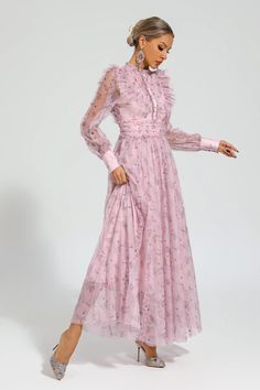 Elevate your style with the Beryl Pink Floral Long Sleeve Dress. Designed with a gentle breeze of femininity, this dress features a high-waisted cut and a Peter Pan collar adorned with delicate frills. Perfect for beach getaways or birthday celebrations, this long dress exudes a graceful charm that will turn heads wherever you go.  Dress Length: Approx 140cm Materials: Polyester Gentle Dry Clean Only  The model is 5 ft 7 and wears size S  Color may vary due to lighting on images. The product ima Elegant Chiffon Ruffle Dress For Garden Party, Feminine Chiffon Dress With Ruffled Skirt, Chiffon Maxi Dress With Ruffles For Daywear, Chiffon Dress With Ruffled Skirt, Elegant Pink Maxi Dress With Ruffled Skirt, Elegant Pink Midi Dress With Ruffled Skirt, Elegant Dresses With Ruffled Skirt For Daywear, Elegant Daywear Dress With Ruffled Skirt, Elegant Chiffon Ruffle Dress For Spring