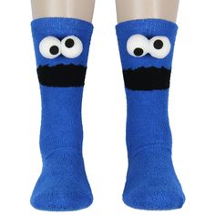 Step into the whimsical world of Sesame Street with the Cookie Monster 3D Eyes Chenille Fuzzy Crew Socks, where fun meets cozy in a one-of-a-kind fashion statement. These aren't just socks; they're a plush tribute to one of the most beloved characters from the neighborhood of Sesame Street—Cookie Monster! Adorning these fuzzy wonders is the endearing face of the cookie-loving monster himself, complete with his signature wide-eyed gaze. What sets these socks apart is the imaginative use of 3D plu Casual Blue Super Soft Socks, Soft Blue Casual Socks, Casual Soft Blue Socks, Playful Super Soft Socks For Playtime, Comfortable Blue Socks For Playtime, Cute Blue Socks For Playtime, Non-slip Blue Socks For Winter, Fun Winter Non-slip Socks, Fun Non-slip Winter Socks