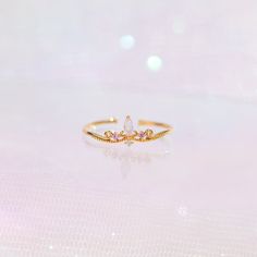 A ring fit for royalty! Our Her Highness Ring is the best accessory for when you want to add elegance, glam, and fierceness to your look! 18k gold plated, 18k rose gold plated, or rhodium plated over brass with a protective coating Cubic zirconia stones Slightly adjustable Approx 7mm width Shop our entire Magical Colle Cute Clothing Stores, Always Shine, Sparkling Rings, Necklace Chain Lengths, Ring Fit, Wrap Rings, Jewelry Companies, Girls In Love, Pretty Jewellery