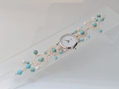 Description: Name: handmade turqouise beads bracelet watches Watch Case: IP plating              Size: 26mm            Mov't: Japanese  GL20 Band Width: 14mm Watch  Length: 17.5cm+3cm adjustable chain Band Material: copper wire + turquoise beads         Gurantee: 2 years gurantee for watch functional issues. Length and stone beads can be customized as you request.                          Package: Gift box as in the picture Shipping time: We make the item as soon as you order it, so it takes 3-5 Elegant Handmade Turquoise Beaded Bracelets, Elegant Turquoise Beaded Bracelets As Gift, Elegant Nickel Free Turquoise Beaded Bracelets, Handmade Beaded Bracelet For Anniversary, Elegant Nickel-free Turquoise Beaded Bracelets, Elegant Turquoise Jewelry With Bracelet Strap, Elegant Turquoise Beaded Bracelet, Beaded Watches, Turquoise Bead Bracelet