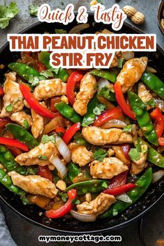 chicken stir fry in a skillet with red peppers and green bell peppers on the side