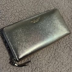 New Without Tags - Never Used In Excellent Condition Luxury Kate Spade Wallet For Evening, Luxury Kate Spade Wallets For Evening, Kate Spade Luxury Evening Wallets, Luxury Everyday Kate Spade Wallets, Luxury Silver Travel Wallet, Luxury Silver Wallet For Travel, Kate Spade Leather Wallets As Gift, Elegant Kate Spade Travel Wallet, Formal Kate Spade Leather Wallets