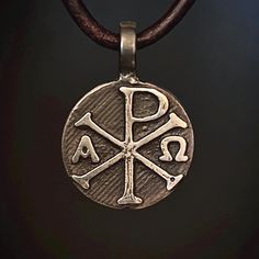 Beautiful, 100% pure silver Chi Rho pendant.  Nothing is pre-made and ready to ship, Everything is made to order, current wait time is 2-3 weeks. If you need your order expedited, please reach out and I can try to accommodate that with a $25 expediting fee. Thank you for your patience! I am a small business and get orders made as quickly as possible.  As the owner and artisan behind Valkyrie Steel in Bigfork, Montana, I take great pride in transforming raw materials into meaningful, handcrafted Bigfork Montana, Chi Rho, Old Symbols, Christian Symbols, Leather Necklace, Made In America, Hand Forged, Pure Silver, Fine Silver