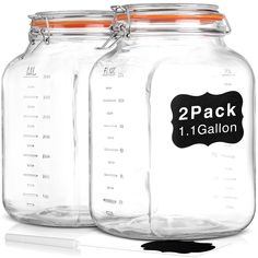 two mason jars with labels on them for each one gallon and the other half full