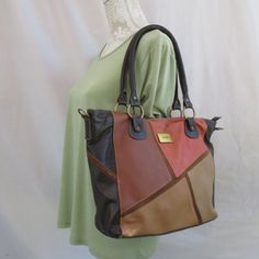 Earth Tones Genuine Leather Patchwork Vintage 80s Matiz Carryall Bag Purse Very Good Used Condition - Minor Scuffs On Back And Pen Marks On Lining - See Pix Gorgeous & Supple This Earth Tones Patchwork Bag Will Complement Almost Any Outfit Essential Everyday Carryall Bag Smartly Organized, Carry For Work And Play Roomy Single Main Compartment Has Full Zip Closure 1 Zip & 2 Tuck Interior Pockets D-Rings On Both Sides Would Accommodate A Cross Body Strap (Not Included) 100% Genuine Leather Self Authentic Matiz Logo Fabric Liner Handles Approximately 19" Bag Is Approximately 11" X 11.5" X 4" New To Poshmark? Use Code Xela8art At Sign-Up To Receive $10 Off Your First Order Bundle 2 Or Mo Leather Patchwork, Guess Bags, Brown Handbag, Patchwork Bags, Large Shoulder Bags, Black Shoulder Bag, Carry All Bag, Kate Spade Handbags, 80s Vintage