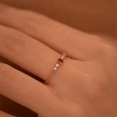 Dainty Ruby Gold Ring, July Birthstone Rings, Ruby Diamond Ring, Red Ruby Stacking Ring, Genuine Ruby Rings, Graduation Ring, Casual Rings We use the highest quality moissanite! Moissanite: ✦ Color: D Colorless ✦ Clarity: VVS1 OR All our diamonds are 100% natural. We use only conflict-free diamonds and gemstones. Diamond: ✦ Color: F-G ✦ Clarity: SI1-VS ✦PRODUCT DETAILS✦ → center stone: natural ruby → accent stone: diamonds Also available in other colored gemstones upon request. Please get in tou Red Open Diamond Promise Ring, Red 14k Gold Birthstone Ring For Promise, Red Ruby Open Diamond Ring, Elegant Red Promise Ring, Red Ruby Birthstone Ring In Fine Jewelry Style, Red Gemstone Diamond Ring, Open Ring Style, Red Birthstone Promise Ring Fine Jewelry, Fine Jewelry Red Ruby Birthstone Ring, Red Gemstone Open Diamond Ring