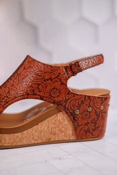 Unleash your potential in the Isabella Tooled Rust Wedge Sandals! With a velcro closure for adjustable support, enjoy all-day comfort and unshakable confidence with every step.Fit: True to Size. If you wear a 1/2 size or have a wide width foot, size up a half size. Heel: 3" Brand: Very G Comfortable Adjustable Wedge Heel Sandals, Comfortable Adjustable Wedge Sandals With Round Toe, Adjustable Closed Toe Wedge Sandals, Adjustable Comfortable Wedge Sandals, Comfortable Adjustable Closed Toe Wedge Sandals, Wedge Sandals With Adjustable Strap And Round Toe, Adjustable Closed-toe Wedge Sandals With Heel Strap, Adjustable Closed Toe Wedge Sandals With Cushioned Footbed, Adjustable Cushioned Closed Toe Wedge Sandals