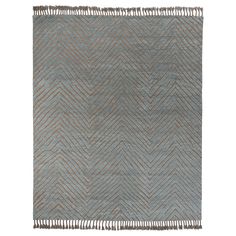 a blue rug with fringes on it