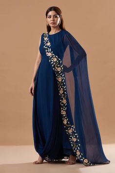 Midnight blue georgette draped dress with sequins embroidery. - Aza Fashions Festive Georgette Dresses With Cape Sleeves, Anarkali Dress With Dupatta And Cape Sleeves, Elegant Dress With Dupatta And Cape Sleeves, Elegant Draped Dress With Resham Embroidery, Embroidered Georgette Dress For Reception, Traditional Draped Embroidered Dress With Dupatta In Georgette, Anarkali Georgette Dress With Cape Sleeves, Blue Floral Embroidered Dress For Wedding Guest, Elegant Blue Embroidered Party Dress