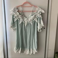 Nwt. Gorgeous Dress But It Is See-Through. Would Be Perfect As A Swim Coverup Or Could Wear As A Dress With A Slip Underneath. Color Is Mint Green And White Flowy V-neck Sundress With Lace Trim, Off-shoulder Mini Dress With Lace Trim For Beach, Casual Off-shoulder Lace Dress, Flowy Summer Mini Dress With Lace Trim, Forever 21 Green Spring Dress, White Off-shoulder Summer Sundress, Forever 21 Ruffled Beach Dress, Forever 21 Beach Dress With Ruffles, Summer Tops With Lace Trim And Mini Length