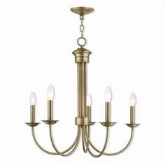 a brass chandelier with five lights hanging from it's center and four arms