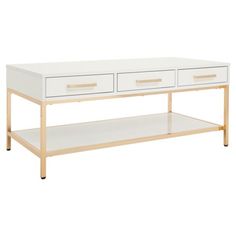 a white and gold coffee table with two drawers