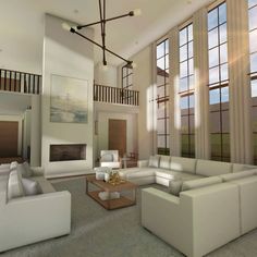 a large living room with white furniture and windows