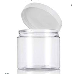 an empty glass jar with a lid is shown on a white background and has the words,