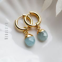 💙 Dive into elegance with our Aquamarine Hoop Earrings, perfectly celebrating the serene beauty of March's birthstone jewelry. Elevate your style with these crystal birthstone huggie hoop earrings, adding a touch of sophistication and enchantment to any ensemble 💙 ⭒ Material: Stainless Steel  ⭒ Finish: Silver * Gold * Rose Gold ⭒ Hoop Size:  thickness: 2.5mm / internal diameter: 10mm or 14mm ⭒ Gemstone size & plating: approx 10 mm / brass electroplated ⭒ Each pair of hoop earrings comes with a March Birthstone Jewelry, Aquamarine Earrings, Birthstone Earrings, Aquamarine Jewelry, March Birthstone, Birthstone Earring, Huggie Earrings, Huggie Hoop Earrings, March Birth Stone