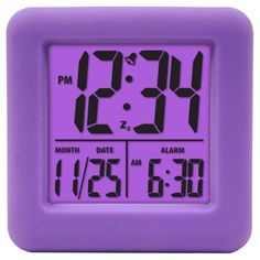 a purple alarm clock with the time at 11 55 pm on it's display