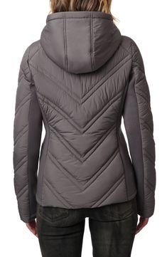 An interior bib adds an extra level of warmth to this hooded puffer jacket detailed with chevron quilting to streamline the silhouette. 25" length (size Medium) Front zip closure Drawcord-toggle hood Thumbhole cuffs On-seam zip pockets Interior bib Lined, with synthetic fill 100% recycled polyester Machine wash, tumble dry Imported Gray Hooded Nylon Puffer Jacket, Hooded Quilted Down Jacket With Zipper Closure, Hooded Down Quilted Jacket With Zipper Closure, Quilted Down Hooded Jacket For Fall, Gray Fitted Outerwear With Drawstring Hood, Fitted Quilted Hooded Puffer Jacket, Hooded Puffer Jacket, Chevron Quilt, Women Jacket