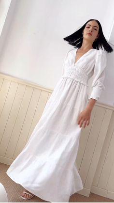 Georgia Maxi Dress will make a lasting impression at your next spring event! With an elastic waist, long sleeves, and tiered peasant skirt.

#springdress #springstyle #whitedresses #GeorgiaMaxiDress #SpringFashion #EventOutfit Long Sleeve Ruched Maxi Dress For Summer, Long Sleeve Ruched Maxi Dress For Brunch, Summer Long Sleeve Maxi Dress With Smocked Bodice, Fitted Long Sleeve Maxi Dress With Gathered Waist, Long Sleeve Maxi Dress With Smocked Cuffs For Summer, Summer Long Sleeve Maxi Dress With Smocked Cuffs, Spring Tiered Dress With Elastic Sleeves, Peasant Style Tiered Skirt Dress For Spring, Long Sleeve Ruched Maxi Dress For Daywear