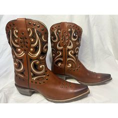 Ariat Premium Made In Mexico Studded/Embroidered Brown Cowgirl Boots. Size W11b M9.5. Premium Studded Leather Uppers, Insole, And Outsole. Nails In Outsole And Heel Block. Embroidery And Cutouts On Upper. Leather Welt. Burnished Toe. In Excellent Condition. Minimal Wear, Outsoles Are Barely Touched. Questions And Offers Welcome. Brown Cowgirl Boots, Ariat Shoes, Size 11 Heels, Western Cowgirls, Western Cowgirl, Studded Leather, Cowgirl Boots, Shoes Heels Boots, Shoes Women Heels