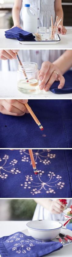 the process is being performed to make embroidery on fabric