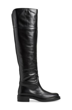 A classic riding boot takes a dramatic turn with smooth leather composition and an over-the-knee silhouette. 1 3/4" heel 20 1/2" shaft; 14" calf circumference Pull-on style Leather upper/synthetic lining and sole Made in Spain Classic Wide Calf Knee-high Boots For Riding, Riding Knee-high Boots With Leather Sole, Classic Riding Knee-high Boots Medium Width, Elegant Wide Calf Knee-high Riding Boots, Elegant Wide Calf Knee-high Boots For Riding, Elegant Knee-high Riding Boots, Elegant Wide Calf Riding Boots, Classic Knee-high Boots With Leather Sole For Riding, Elegant Leather Sole Knee-high Boots For Riding