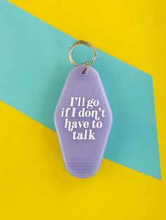 a purple keychain that says, i'll go if i don't have to talk