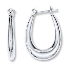 These tapered oval hoop earrings crafted in highly polished sterling silver make a subtle statement. The earrings secure with snap-lock backs. Classic Oval Sterling Silver Hoop Earrings, Silver Oval Hoop Earrings With Polished Finish, Polished Oval Huggie Earrings, Oval Huggie Earrings For Formal Occasions, Classic Silver Teardrop Hoop Earrings, Oval Sterling Silver Hoop Earrings, Oval Hoop Earrings, Jewelry Education, Jewelry Advice