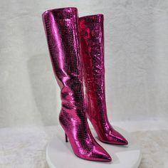 Fuchsia Metallic Festive Pointy Toe With Inseam Side Zipper Snake Skin Textured 4 Inch Stiletto Heel Brand New In Box. Trendy Pink Heeled Boots For Party, Pink Heels For Fall Party, Purple Heeled Boots For Winter Party, Pink Heels For Formal Winter Occasions, Pink Heels For Night Out In Fall, Pink Party Heels For Fall, Pink Formal Heels For Winter, Pink Winter Evening Heels, Purple Knee-high Party Boots