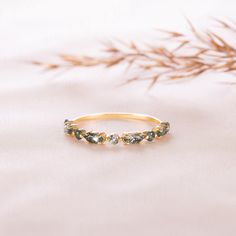 Unique dainty minimalist 14k gold genuine moss agate wedding band, Women moss agate ring, Moss agate promise ring, Perfect gift for her ring WE OFFER UNLIMITED PERIOD INSTALLMENTS PLAN This is a beautiful, stunning, feminine ring that works well for all occasions, styles, and ages. You will love it! Ring information: Stones: Moss Agate Approximate size: 4x2mm (4 stone) Approximate size: 2.0mm (5 stones) Approximate width of Band 1.0mm Front part : 2.2mm Metal type: Gold Installment Payments We offer installment payments for an unlimited period for absolutely all products from our store. If you want to change the terms of installments, please contact us. We can propose many different variantions of it. Customization / Replacements Ring can be made with different stones such as: citrine, per Small Moss Agate Ring, Wedding Moss Agate Ring Jewelry, Elegant Moss Agate Ring With Natural Stones, Moss Agate Wedding Band, Birthstones Ring, Luxury Nature-inspired Rings With Moss Agate, Ring Moss Agate, Moosachat Ring, Agate Wedding