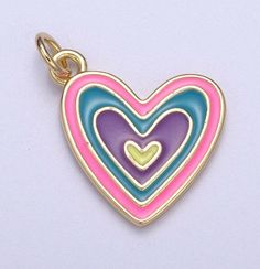 14k Gold Filled Pink Enamel Layer Heart Charm Colorful Love Pendant Size: 22m mx 16.6mm Gold Filled and enamel Charms can be added to our Charms Necklacesor purchase on their own to be worn with your necklace. all charms purchased individually are mounted on 5 mm 20g jump ring SKU: N-305-CL Heart-shaped Enamel Charms Necklaces, Heart-shaped Enamel Charms Necklace, Enamel Heart Charms Necklace, Multicolor Enamel Charm Necklaces, Multicolor Enamel Heart-shaped Jewelry, Multicolor Enamel Heart Jewelry, Multicolor Heart-shaped Enamel Jewelry, Pink Heart Charm For Mother's Day, Cute Heart-shaped Charm Necklaces