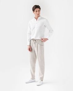 Summer outfits made easy. Our linen pants TRUCKEE with cargo pockets and elasticated waist adjustable by drawstrings are a starting piece that helps create the best summer outfits. Style it with a loose fit linen shirt, a tucked in t-shirt, cozy it up adding a sweater – all is possible. Linen pants come in three colors – white, natural mélange, cinnamon – the more colors you have, the more styling possibilities you unlock. • Elasticated waist with drawstrings • Cargo pockets Please note that due Linen Cargo Pants With Pockets, Elastic Waistband Linen Cargo Pants, Linen Cargo Pants With Elastic Waistband, Summer Linen Cargo Pants With Tapered Leg, Relaxed Fit Linen Cargo Pants Ankle-length, Linen Cargo Pants With Side Pockets, Ankle-length, Ankle-length Linen Cargo Pants With Side Pockets, Linen Ankle-length Cargo Pants With Side Pockets, Casual Baggy Linen Cargo Pants