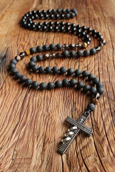 Thanks for visiting my place of inspired creations! I believe you will find something that speaks to your heart and resonates with your vibration! :) 108 beads Mens Cross Mala Necklace Steel Cross Rosary Beaded Necklace* ala Beads 108 Christian Jewelry Meditation Gifts Protection Necklace Spiritual A Mala is a strand of 108 beads, plus a guru stone, traditionally used for counting during mantra meditations, and has been used as a meditation aid since at least the 10th century. Crosses symbolize Spiritual Oval Beads For Jewelry Making, Spiritual Black Beaded Necklaces, Spiritual Black Beads Necklace For Meditation, Spiritual Beaded Rosary For Jewelry Making, Spiritual Black Beaded Necklaces For Meditation, Spiritual Beads For Jewelry Making, Spiritual Oval Beads Crystal Necklaces For Healing, Adjustable Spiritual Beaded Necklaces, Adjustable Spiritual Beaded Necklace