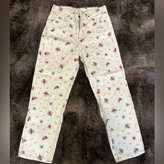 White Wrangler Jeans With Flowers, Never Worn, Still Has Tag Casual Jeans For Rodeo, Casual Spring Bottoms For Rodeo, Casual Bottoms For Rodeo In Spring, Spring Casual Rodeo Jeans, Casual Jeans For Rodeo And Spring, Retro Cotton Jeans For Rodeo, Retro White Jeans For Spring, White Retro Jeans For Spring, White Cotton Jeans With Floral Print