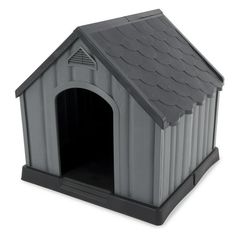 a gray dog house with a black roof