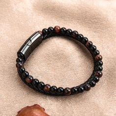 Style: Europe and America Material: Leather Casual Brown Leather Beaded Bracelets, Casual Black Leather Beaded Bracelets, Trendy Brown Rectangular Bracelet, Adjustable Black Beaded Bracelets For Everyday, Red Tiger, Red Tigers Eye, Buckle Bracelet, Mens Leather Bracelet, Leather Bracelets