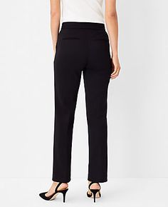 Elevate your wardrobe with the Ann Taylor Petite Pintucked Straight Leg Pant in Double Knit. These pants redefine sophistication with their timeless straight-leg silhouette and classic lean fit, creating a chic, structured look that's perfect for any occasion. The pintucked detailing adds a touch of elegance, making these pants a must-have for the fashion-forward professional.

- Size: Petite 8
- Color: Black
- Material: 78% Polyester, 15% Rayon, 7% Spandex
- Gender: Female
- Fit: Regular fit, l Elegant Stretch Dress Pants Straight Fit, Elegant Stretch Straight Dress Pants, Elegant Straight Stretch Dress Pants, Elegant Tailored Straight Bottoms, Elegant Straight Bottoms For Business Casual, Chic Straight Pants, Chic Stretch Pants With Straight Silhouette, Elegant Straight Pants For Work, Elegant Straight Dress Pants In Elastane