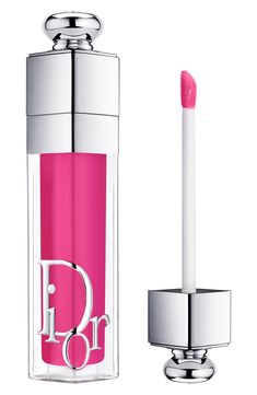 What it is: The iconic lip-plumping gloss gets a refresh with a new 90% natural-origin-ingredient formula, a reimagined case and updated shades.What it does: The formula features 90% natural-origin ingredients and is infused with cherry oil and hyaluronic acid. The plumping gloss smoothes and makes lips appear bigger, leaving them hydrated for up to 24 hours. It is now available in a new range of shiny shades with clear, intense, shimmering and holographic finishes. How to use: Apply the gloss d Dior Lip Addict, Dior Lipgloss, Dior Addict Lip Maximizer, Dior Lip, Dior Addict Lip, Lip Primer, How To Apply Lipstick, Dior Addict, Lip Hydration