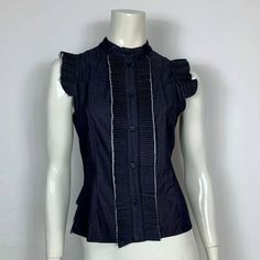 ITEM DESCRIPTION: Brand: BLUGIRL BLUMARINE DENIM Model: Sleeveless denim shirt with pleated inserts, standing collar and button closure, not elasticated. Size W28 D36 F38 UK10 USA6 ES38 Italian size 42, check the measurements Material: 100% cotton, Buttoning with 6 buttons Condition: new, with label Measures: shoulders 31 cm chest 46 cm total length 55 cm How are the measurements taken? The shirt is buttoned and spread on a flat surface, all measurements are taken from the back of the shirt Shou Blumarine Top, Sleeveless Denim Shirt, Blugirl Blumarine, Womens Blouses, Standing Collar, Top Shirt Women, Sleeveless Shirt, Shirt Top, Denim Shirt