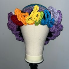 This Is A Handmade Hat In Celebration Of Pride Month. There Is An Elastic Band Crocheted To The Inside Of The Hat To Keep It Secured To Your Head. It Is One Size Only. Multicolor Yarn Mini Hat One Size, Adjustable Multicolor Costume Headband, Multicolor One Size Headband Hat, Multicolor Headband Hat, Multicolor Brimmed Mini Hats In Yarn, Adjustable Multicolor Whimsical Crochet Hat, Multicolor One Size Beanie Costume Hats, Whimsical Multicolor Brimmed Crochet Hat, Fitted Multicolor Hand Knitted Crochet Hat