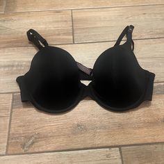 Black Victoria’s Secret Bra Size 38c Classic Black Bra With Removable Pads, Classic Black Bra With Padded Cups, Classic Black Bra With Medium Bust Support, Black Padded Cup Bra, Black Full Coverage Classic Bra, Classic Black Underwire Bra, Fitted Padded Black Bra, Fitted Black Padded Bra, Classic Black Seamless Bra